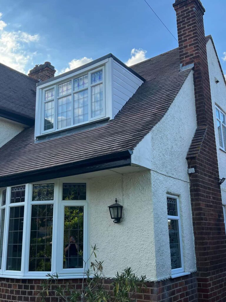 This is a photo of a dormer window which has just had some repairs carried out where the roof and the dormer meet. Works carried out by LS Roofing Woodley